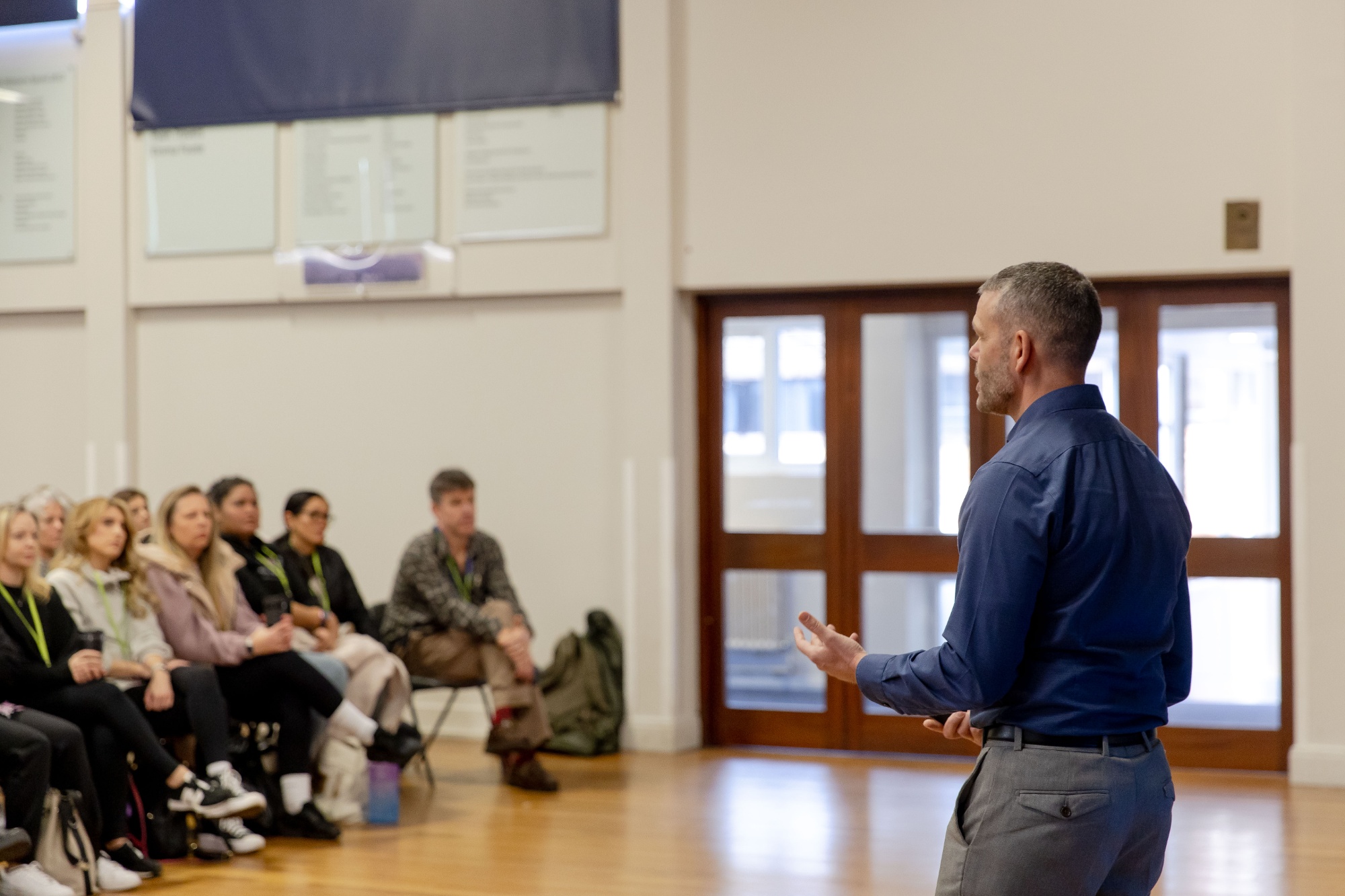 Speaker presenting to Greensand staff