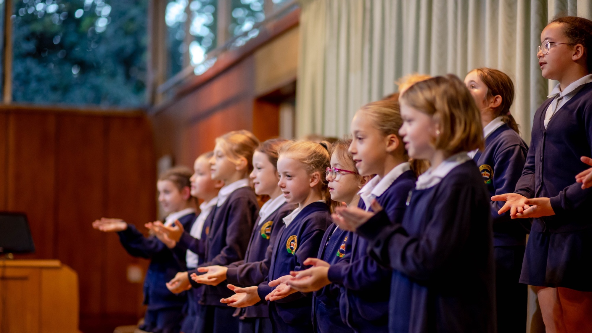 School children from Greensand schools singing in a joint choir